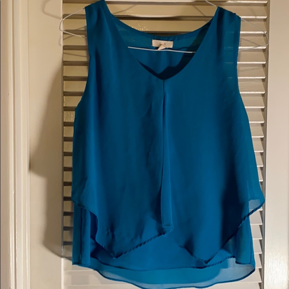 Elegant blue blouse by EM